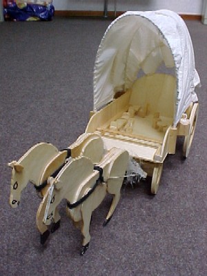 Miniatuur huifkar met paarden